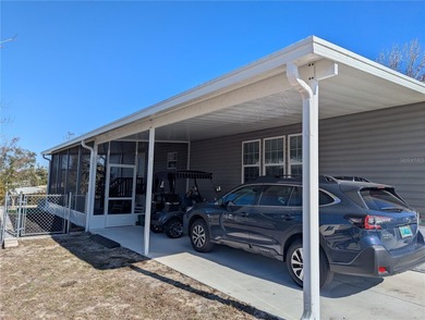 Welcome home to this beautifully maintained 2022 manufactured on Brookridge Country Club in Florida - for sale on GolfHomes.com, golf home, golf lot