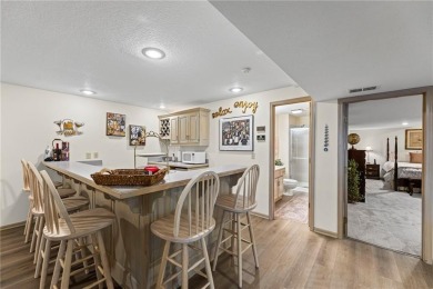 Discover a distinguished Tudor-style home by builder Jim Lambie on Leawood South Country Club in Kansas - for sale on GolfHomes.com, golf home, golf lot