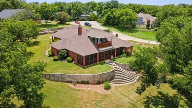 Live the life you've imagined. This spectacular home nestled in on Pecan Plantation Country Club in Texas - for sale on GolfHomes.com, golf home, golf lot