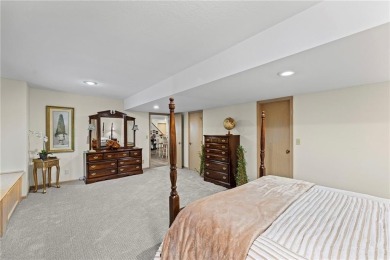 Discover a distinguished Tudor-style home by builder Jim Lambie on Leawood South Country Club in Kansas - for sale on GolfHomes.com, golf home, golf lot