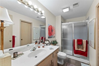 Discover a distinguished Tudor-style home by builder Jim Lambie on Leawood South Country Club in Kansas - for sale on GolfHomes.com, golf home, golf lot