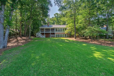 DISCOVER TIMELESS SOUTHERN ELEGANCE AND LUXURY LAKEFRONT LIVING on Great Waters Course At Reynolds Plantation in Georgia - for sale on GolfHomes.com, golf home, golf lot