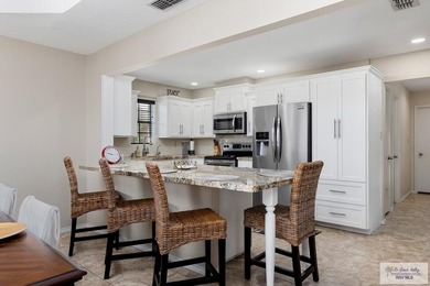 Immaculate 3BR/3BA home in Rancho Viejo with pond & fairway on Rancho Viejo Resort and Country Club in Texas - for sale on GolfHomes.com, golf home, golf lot