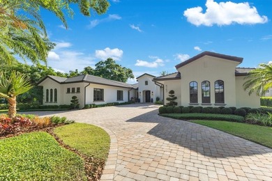 Fully rebuilt and expanded in 2019, this rare single-story on Isleworth Golf and Country Club in Florida - for sale on GolfHomes.com, golf home, golf lot