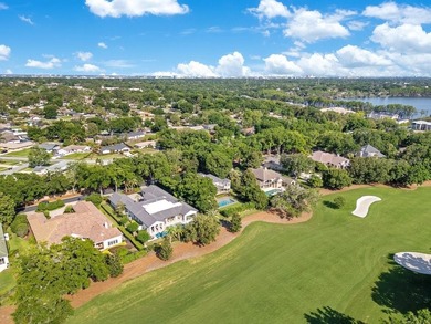 Fully rebuilt and expanded in 2019, this rare single-story on Isleworth Golf and Country Club in Florida - for sale on GolfHomes.com, golf home, golf lot