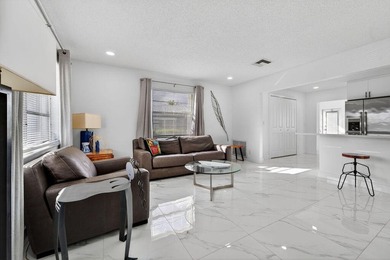 This home is completely remodeled in active 55+ community with on Leisureville Community Golf Course in Florida - for sale on GolfHomes.com, golf home, golf lot