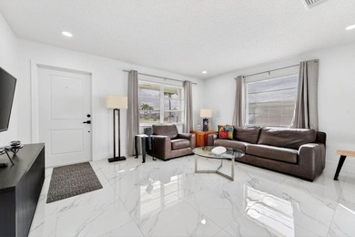 This home is completely remodeled in active 55+ community with on Leisureville Community Golf Course in Florida - for sale on GolfHomes.com, golf home, golf lot