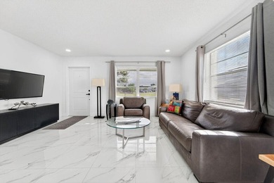 This home is completely remodeled in active 55+ community with on Leisureville Community Golf Course in Florida - for sale on GolfHomes.com, golf home, golf lot