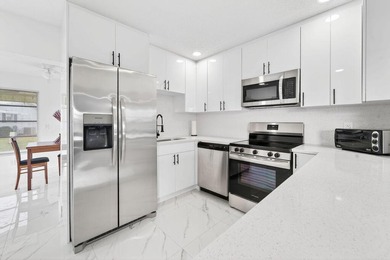 This home is completely remodeled in active 55+ community with on Leisureville Community Golf Course in Florida - for sale on GolfHomes.com, golf home, golf lot