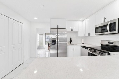 This home is completely remodeled in active 55+ community with on Leisureville Community Golf Course in Florida - for sale on GolfHomes.com, golf home, golf lot