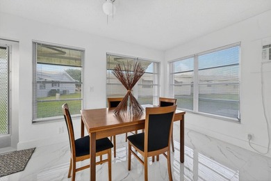 This home is completely remodeled in active 55+ community with on Leisureville Community Golf Course in Florida - for sale on GolfHomes.com, golf home, golf lot