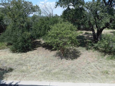Level lot with large trees on a cul-de-sac street.  This on Slick Rock Golf Course - Horseshoe Bay in Texas - for sale on GolfHomes.com, golf home, golf lot
