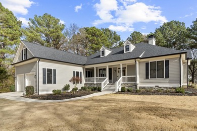 Located in the prestigious Great Waters community at Lake Oconee on Great Waters Course At Reynolds Plantation in Georgia - for sale on GolfHomes.com, golf home, golf lot