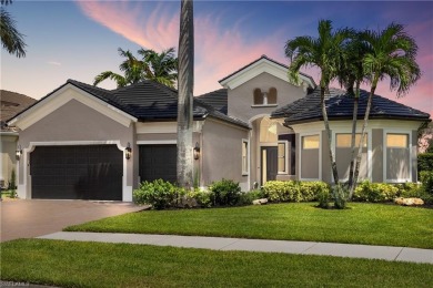 This fully renovated custom residence presents a rare on West Bay Beach and Golf Club in Florida - for sale on GolfHomes.com, golf home, golf lot