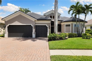 This fully renovated custom residence presents a rare on West Bay Beach and Golf Club in Florida - for sale on GolfHomes.com, golf home, golf lot