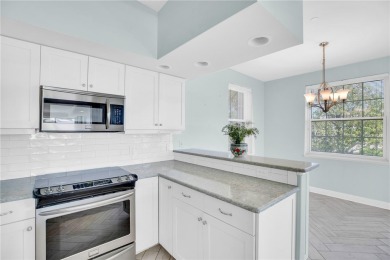 Lovely Oak Harbor condo residence that lives like a home on Oak Harbor Country Club in Florida - for sale on GolfHomes.com, golf home, golf lot
