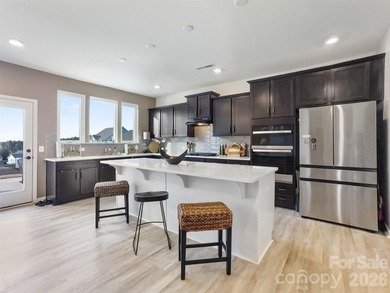 Experience spectacular living in the highly sought-after on Edgewater Golf Club in South Carolina - for sale on GolfHomes.com, golf home, golf lot