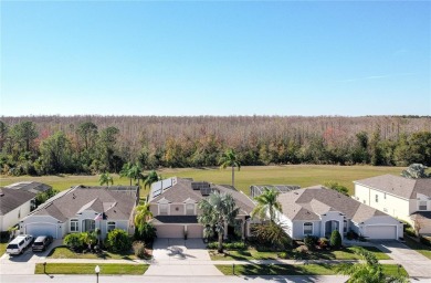 Discover this stunning 5-bedroom, 3-bathroom, 2-story home on Highlands Reserve Golf Club in Florida - for sale on GolfHomes.com, golf home, golf lot