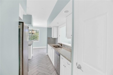 Lovely Oak Harbor condo residence that lives like a home on Oak Harbor Country Club in Florida - for sale on GolfHomes.com, golf home, golf lot