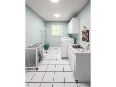This well maintained brick ranch style home located in a on Lakeshore Country Club in Kentucky - for sale on GolfHomes.com, golf home, golf lot