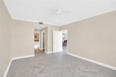 Lovely Oak Harbor condo residence that lives like a home on Oak Harbor Country Club in Florida - for sale on GolfHomes.com, golf home, golf lot