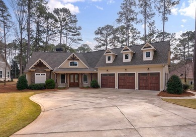 Welcome to this beautifully maintained Craftsman-style home on Harbor Club Golf and Country Club in Georgia - for sale on GolfHomes.com, golf home, golf lot