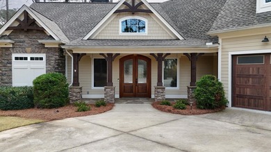 Welcome to this beautifully maintained Craftsman-style home on Harbor Club Golf and Country Club in Georgia - for sale on GolfHomes.com, golf home, golf lot