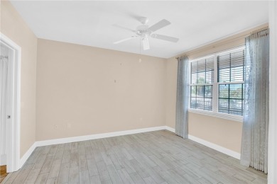 Lovely Oak Harbor condo residence that lives like a home on Oak Harbor Country Club in Florida - for sale on GolfHomes.com, golf home, golf lot