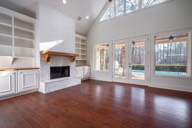 Welcome to this beautifully maintained Craftsman-style home on Harbor Club Golf and Country Club in Georgia - for sale on GolfHomes.com, golf home, golf lot