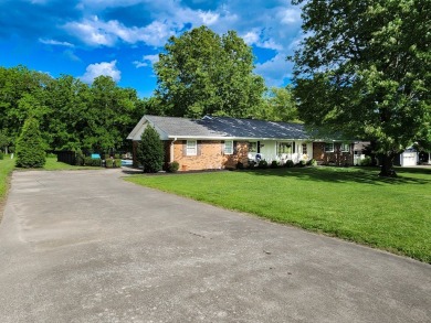 This well maintained brick ranch style home located in a on Lakeshore Country Club in Kentucky - for sale on GolfHomes.com, golf home, golf lot