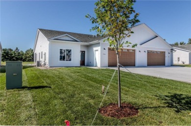 Welcome to this stunning townhome on the beautiful Pebble Creek on Pebble Creek Golf Club in Minnesota - for sale on GolfHomes.com, golf home, golf lot