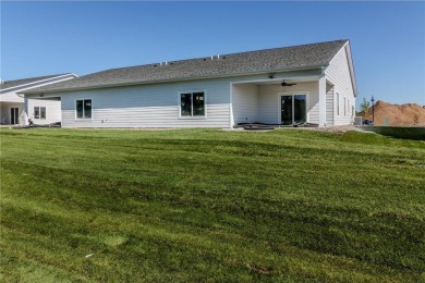 Welcome to this stunning townhome on the beautiful Pebble Creek on Pebble Creek Golf Club in Minnesota - for sale on GolfHomes.com, golf home, golf lot