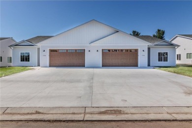 Welcome to this stunning townhome on the beautiful Pebble Creek on Pebble Creek Golf Club in Minnesota - for sale on GolfHomes.com, golf home, golf lot