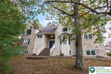 Welcome to this magnificent 3-level residence offering an on Country Club of the Poconos Golf Course in Pennsylvania - for sale on GolfHomes.com, golf home, golf lot