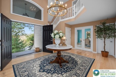 Welcome to this magnificent 3-level residence offering an on Country Club of the Poconos Golf Course in Pennsylvania - for sale on GolfHomes.com, golf home, golf lot