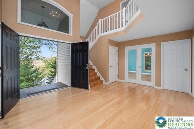 Welcome to this magnificent 3-level residence offering an on Country Club of the Poconos Golf Course in Pennsylvania - for sale on GolfHomes.com, golf home, golf lot