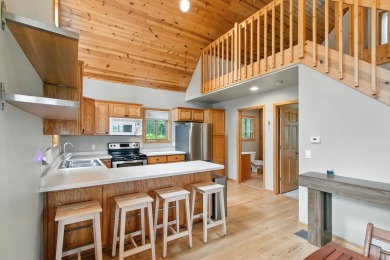 Experience refined lake living in this stunning 3BR, 2BA home on Northern Bay Golf Resort and Marina in Wisconsin - for sale on GolfHomes.com, golf home, golf lot