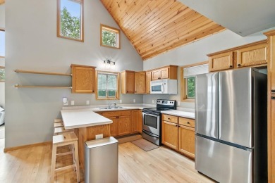 Experience refined lake living in this stunning 3BR, 2BA home on Northern Bay Golf Resort and Marina in Wisconsin - for sale on GolfHomes.com, golf home, golf lot