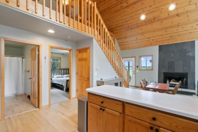 Experience refined lake living in this stunning 3BR, 2BA home on Northern Bay Golf Resort and Marina in Wisconsin - for sale on GolfHomes.com, golf home, golf lot