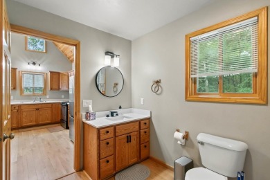 Experience refined lake living in this stunning 3BR, 2BA home on Northern Bay Golf Resort and Marina in Wisconsin - for sale on GolfHomes.com, golf home, golf lot
