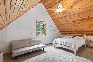 Experience refined lake living in this stunning 3BR, 2BA home on Northern Bay Golf Resort and Marina in Wisconsin - for sale on GolfHomes.com, golf home, golf lot