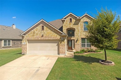 Welcome to this impeccably designed 4-bedroom, 3.5-bathroom home on Frisco Lakes Golf Course in Texas - for sale on GolfHomes.com, golf home, golf lot