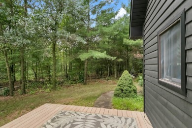 Experience refined lake living in this stunning 3BR, 2BA home on Northern Bay Golf Resort and Marina in Wisconsin - for sale on GolfHomes.com, golf home, golf lot