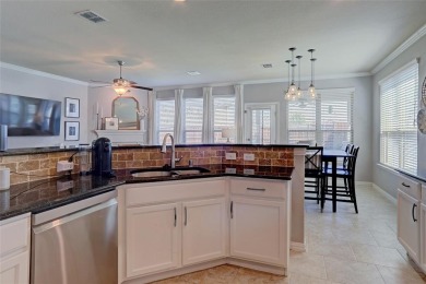 Welcome to this impeccably designed 4-bedroom, 3.5-bathroom home on Frisco Lakes Golf Course in Texas - for sale on GolfHomes.com, golf home, golf lot