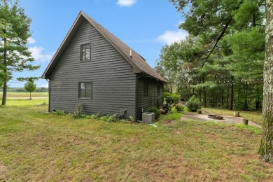 Experience refined lake living in this stunning 3BR, 2BA home on Northern Bay Golf Resort and Marina in Wisconsin - for sale on GolfHomes.com, golf home, golf lot