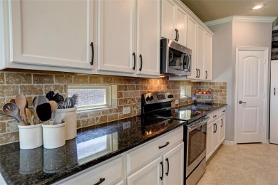 Welcome to this impeccably designed 4-bedroom, 3.5-bathroom home on Frisco Lakes Golf Course in Texas - for sale on GolfHomes.com, golf home, golf lot