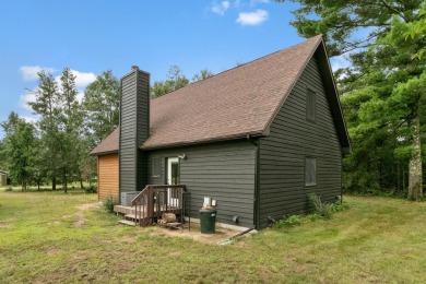 Experience refined lake living in this stunning 3BR, 2BA home on Northern Bay Golf Resort and Marina in Wisconsin - for sale on GolfHomes.com, golf home, golf lot