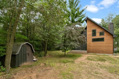 Experience refined lake living in this stunning 3BR, 2BA home on Northern Bay Golf Resort and Marina in Wisconsin - for sale on GolfHomes.com, golf home, golf lot