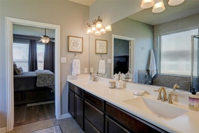 Welcome to this impeccably designed 4-bedroom, 3.5-bathroom home on Frisco Lakes Golf Course in Texas - for sale on GolfHomes.com, golf home, golf lot