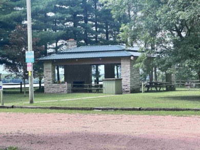 Experience refined lake living in this stunning 3BR, 2BA home on Northern Bay Golf Resort and Marina in Wisconsin - for sale on GolfHomes.com, golf home, golf lot